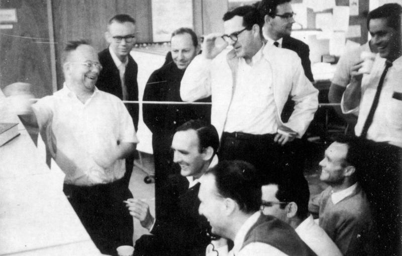 Photo - Archival photo of excited scientists in linac control room.