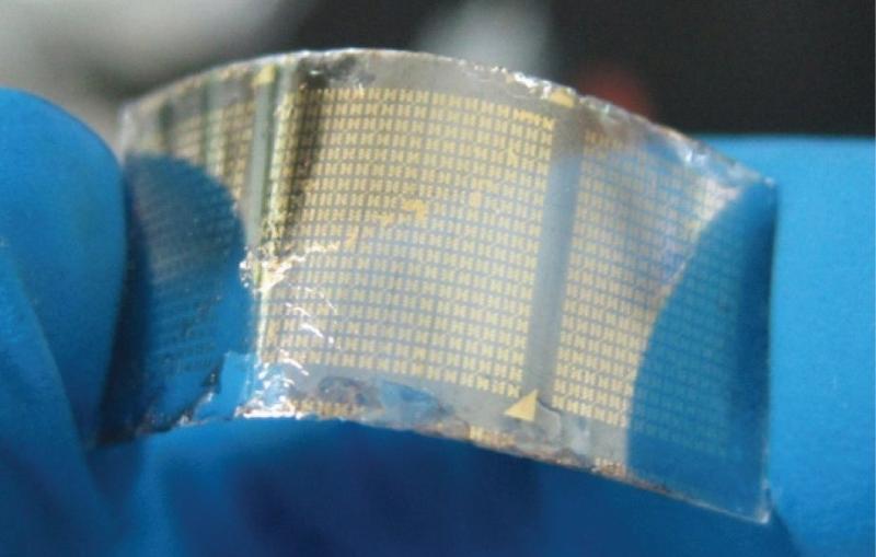 A researcher demonstrates a flexible, transparent electrode incorporating an exotic material known as a topological insulator