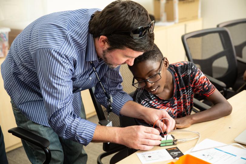 A student works with SLAC mentor at CORE Science Institute 