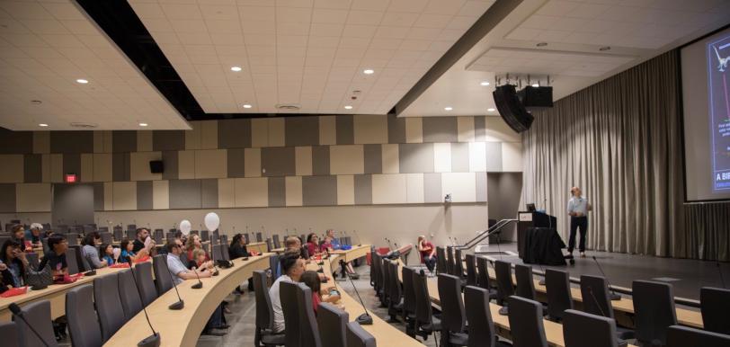 Sam Webb lectures in the Panofsky Auditorium at SLAC.