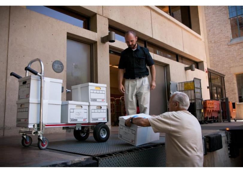 Photo of boxes being unloaded