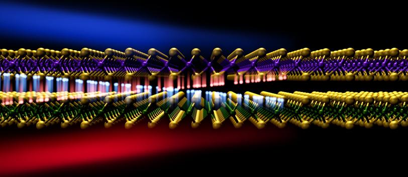 Illustration of electrons giving off electromagnetic waves as they travel between two materials 