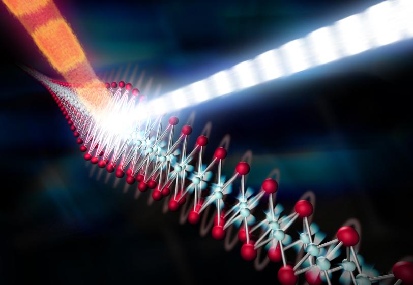 Illustration of a laser beam triggering atomic vibrations in iron selenide