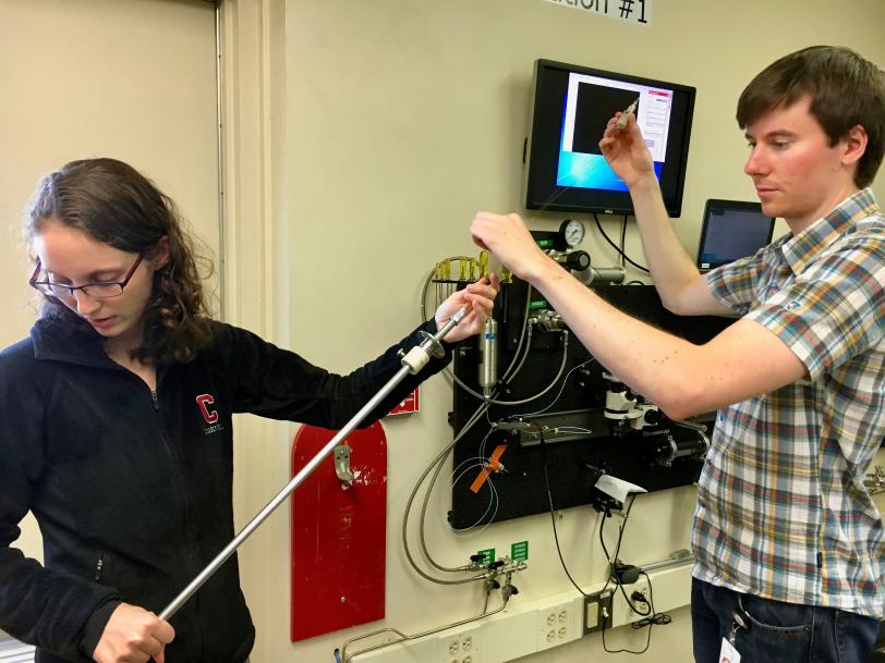 Photo - students prepare sample delivery system