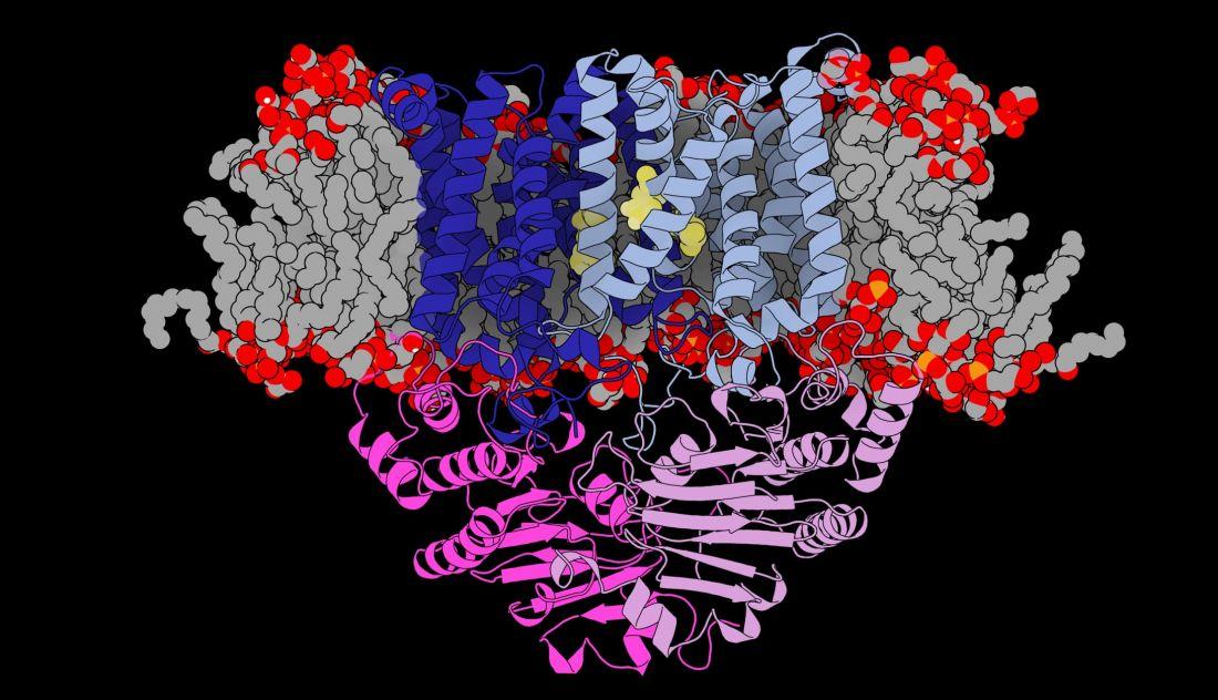 A protein molecule with intertwined spirals around a small yellow center form.  