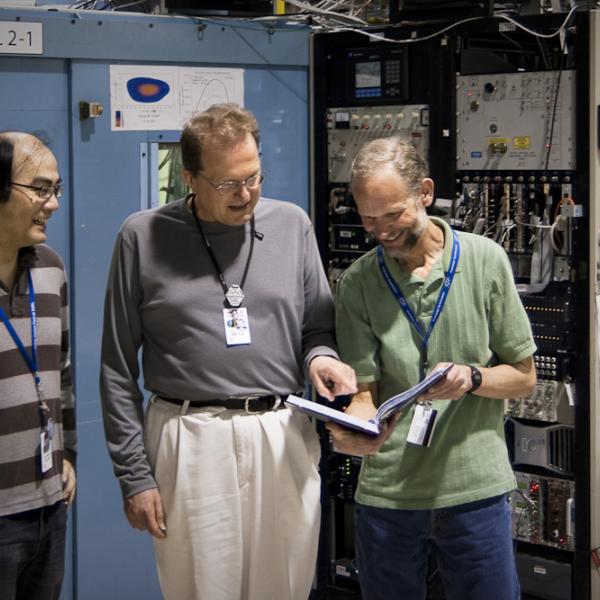 Researchers including Hirohito Ogasawara (left), Anders Nilsson (center), and Mike Toney