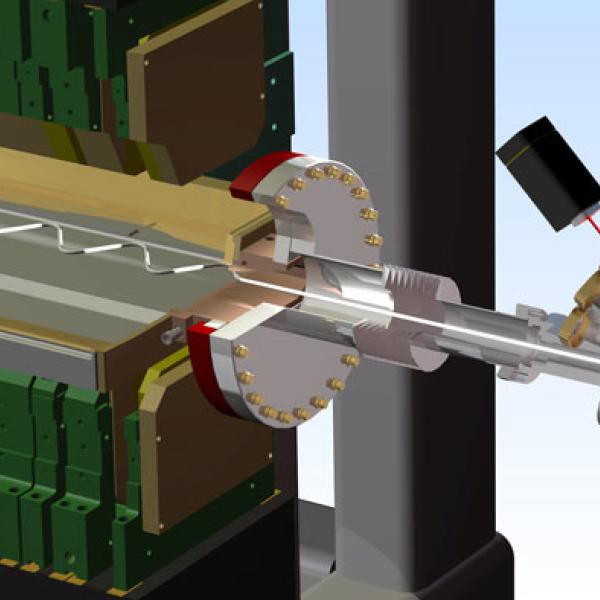 electro-optic crystal (green) placed next to the electron beam (white) in the linear accelerator